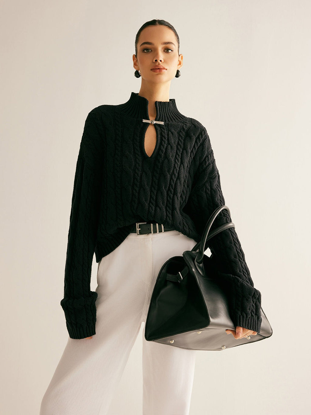 Cable knit keyhole high neck jumper