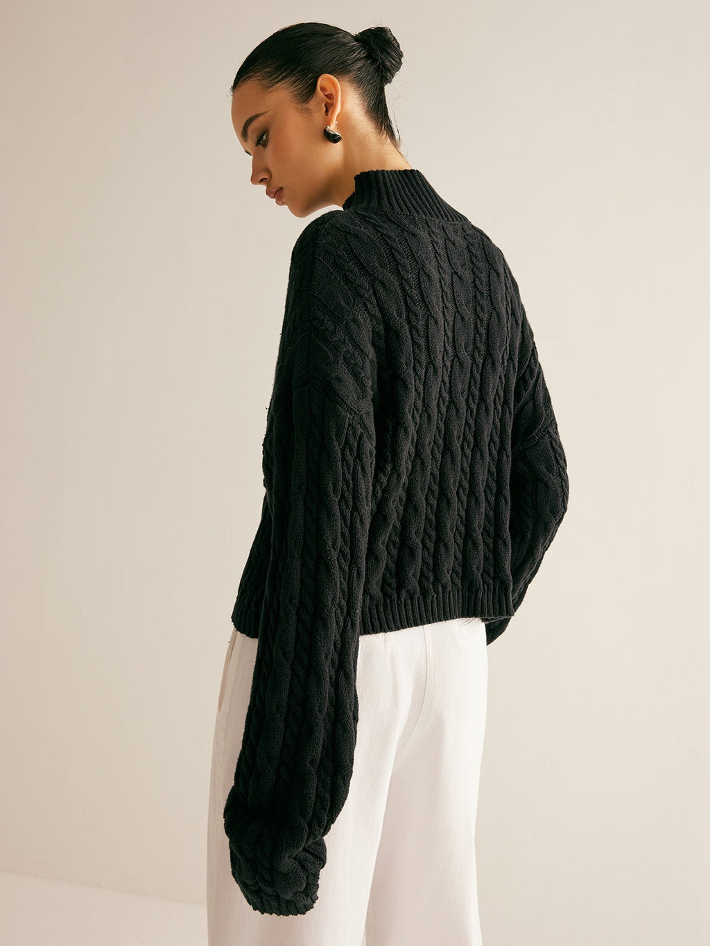 Cable knit keyhole high neck jumper