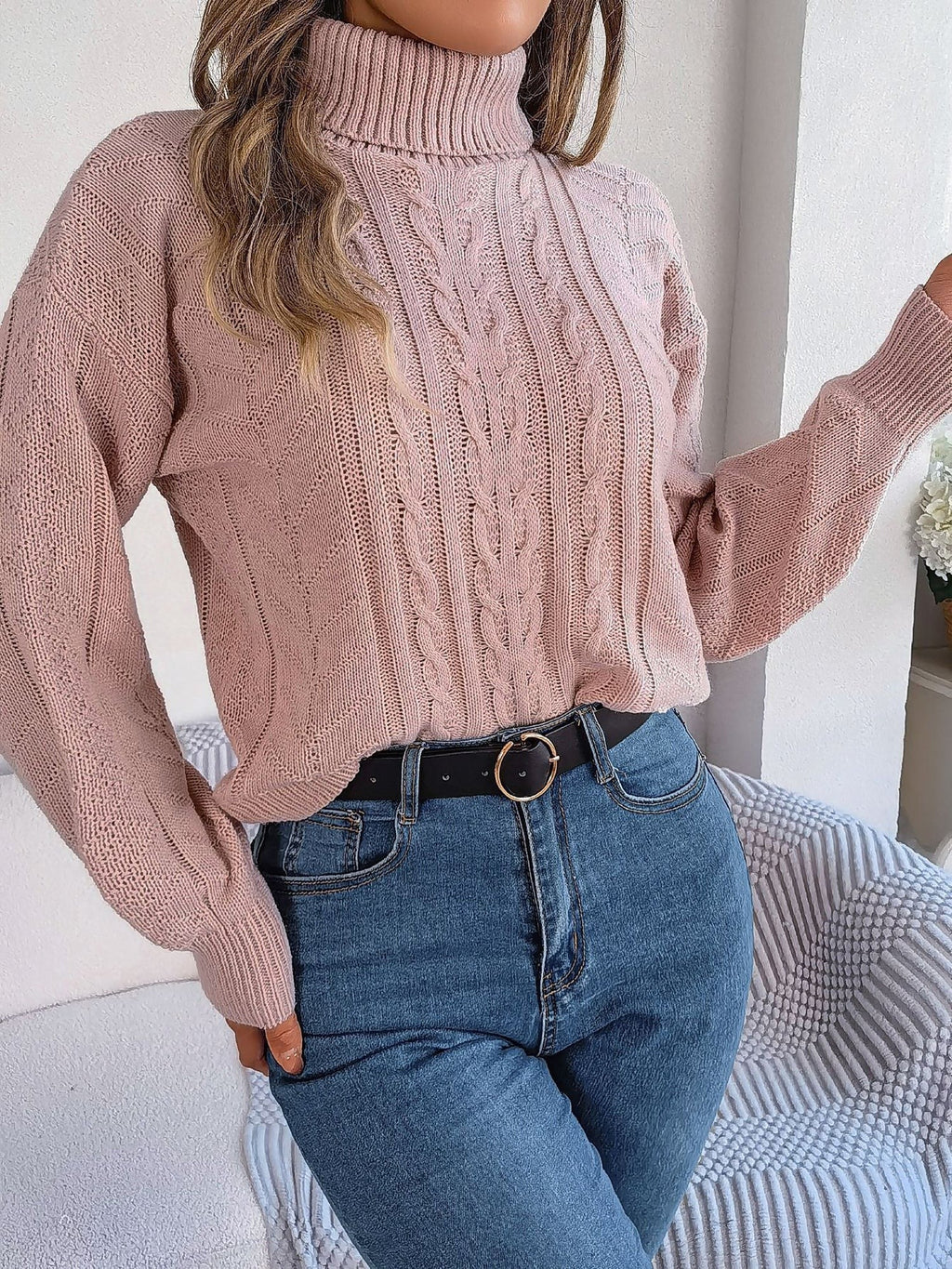 Cable-knit roll neck jumper