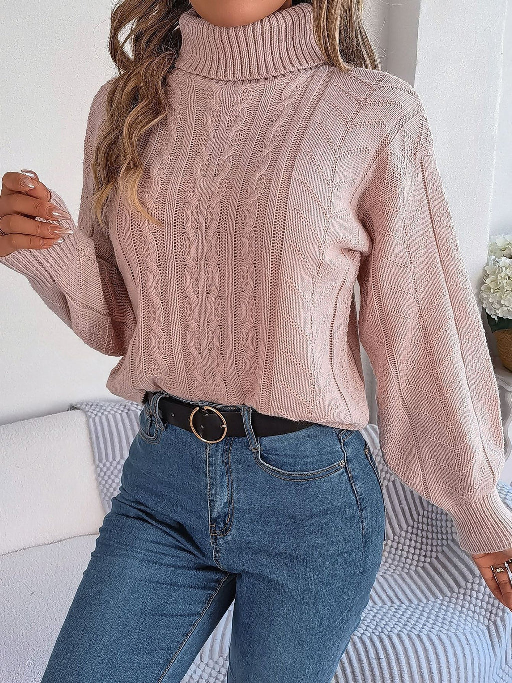 Cable-knit roll neck jumper