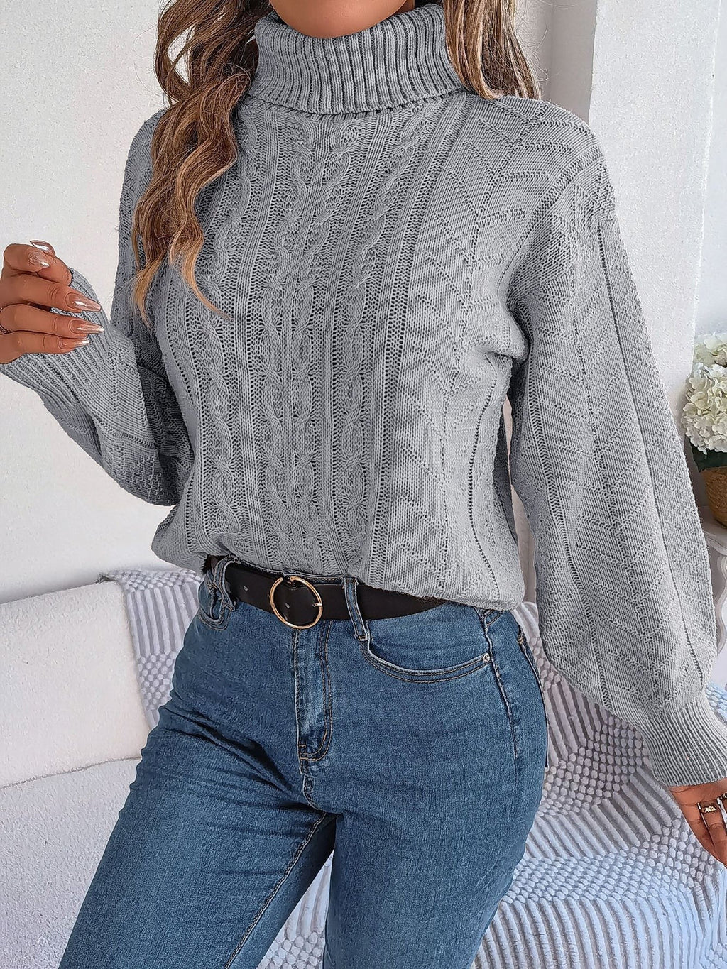Cable-knit roll neck jumper